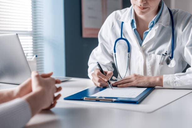Specialist preparing medical equipment for a consultation